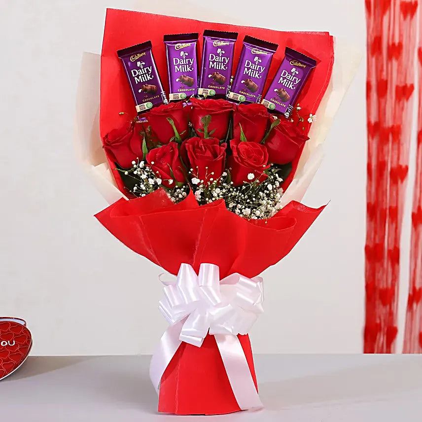 Chocolaty wish dairy milk chocolate and red roses bouquet